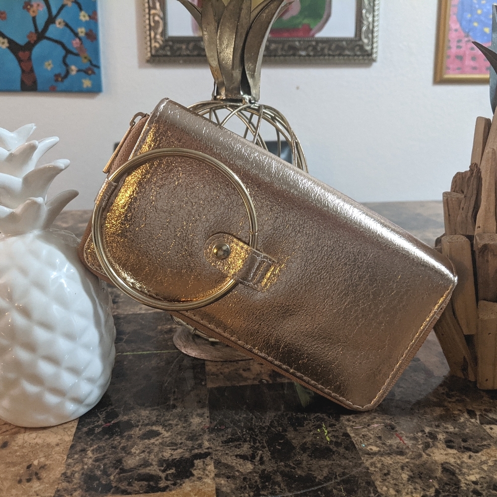 Gold colored o-ring handled wristlet/wallet